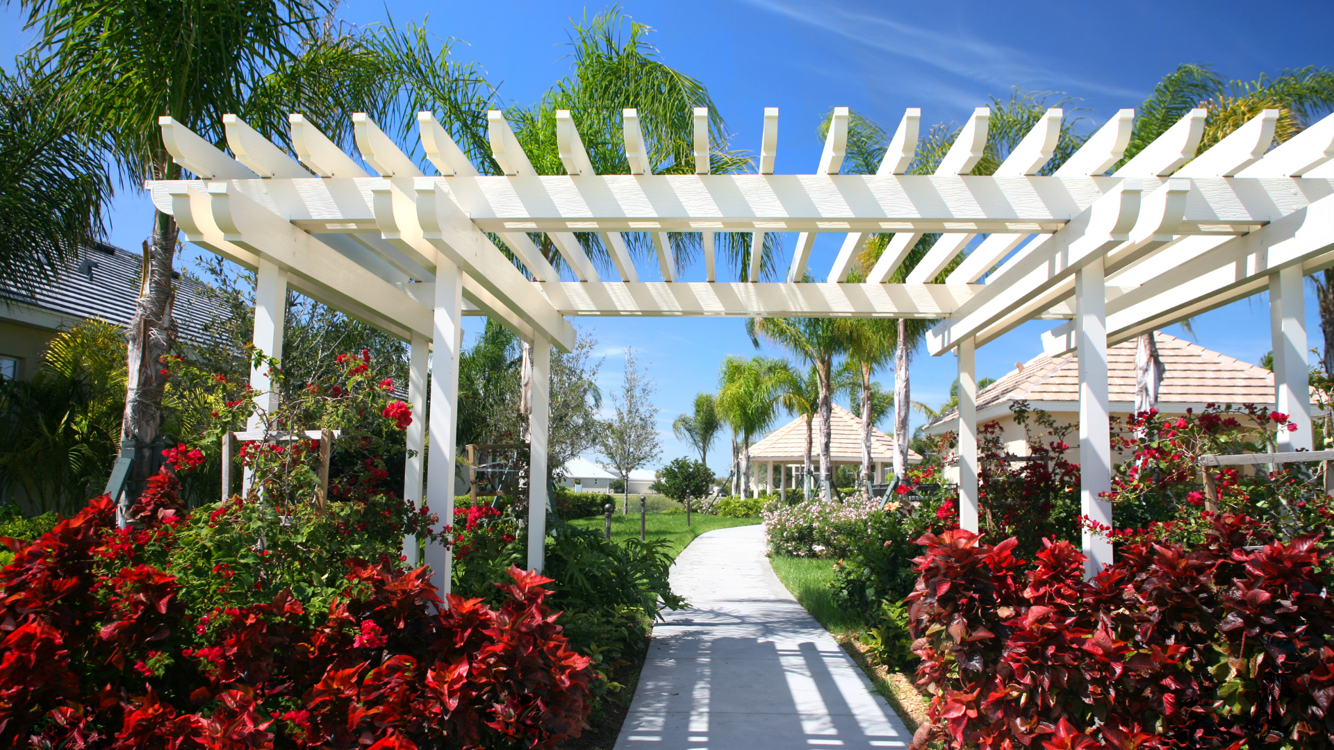 Louvered pergola installation in Jacksonville, FL — adjustable aluminum slat roof for sun and rain protection