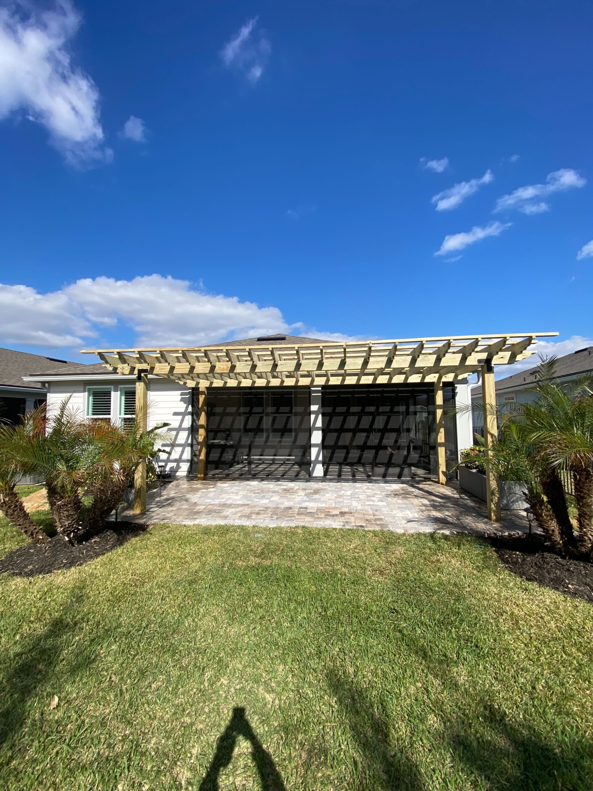 Custom louvered pergola installer in Northeast Florida — manual and motorized adjustable roof systems