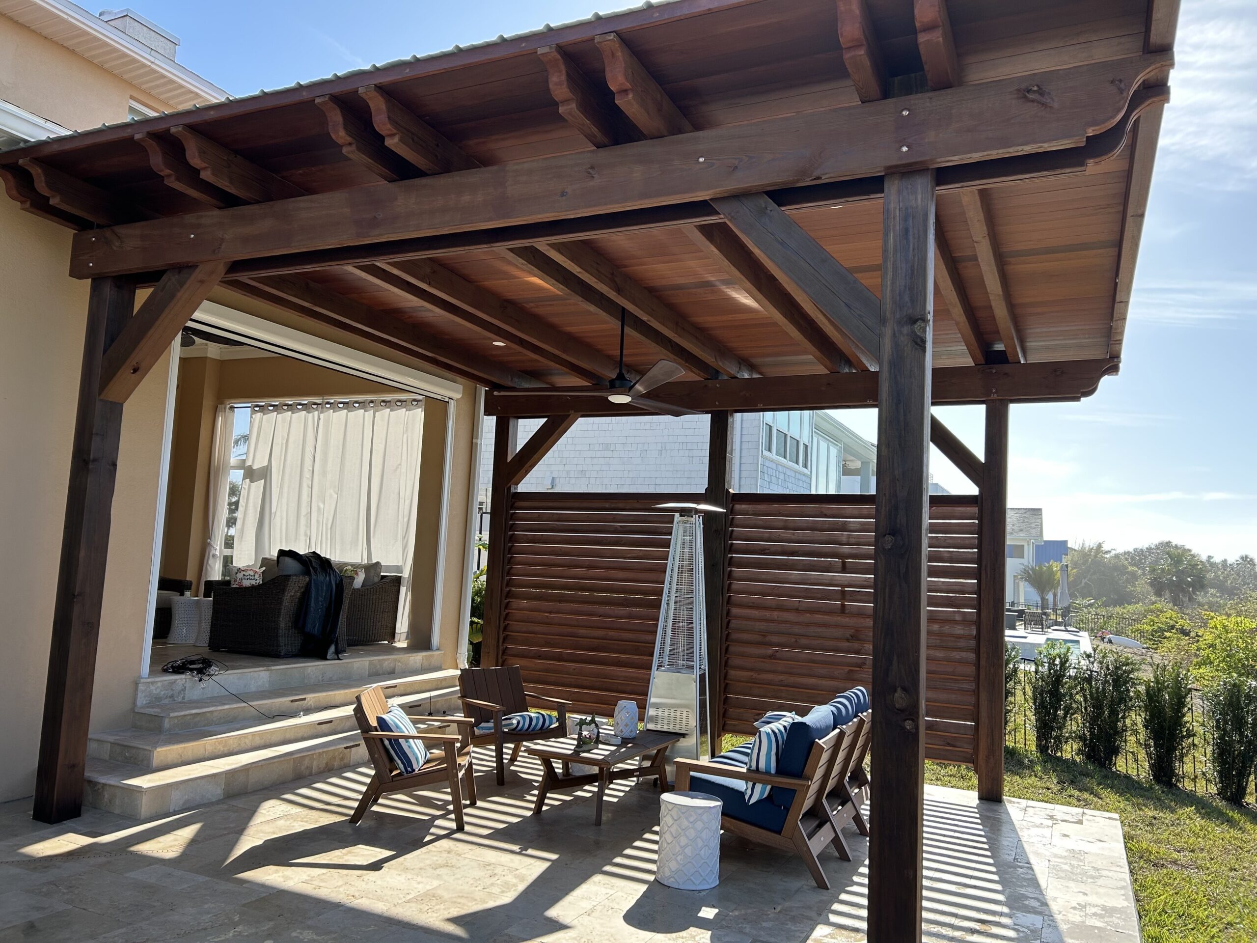 Motorized louvered pergola in Duval County, Florida — hurricane-rated aluminum construction with remote control